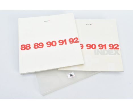 A 1983-92 SWATCH WATCH, THREE SECTION CATALOGUES, within a plastic cover