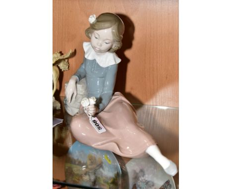 A LARGE NAO FOR LLADRO FIGURE, 'Girl Reclining' No 02010302, by Salvador Debon, issued 1992, length 37cm x height 22cm