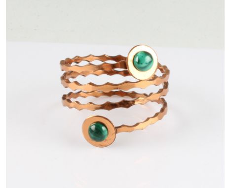 An Arts &amp; Crafts style paste set coil design bangle.