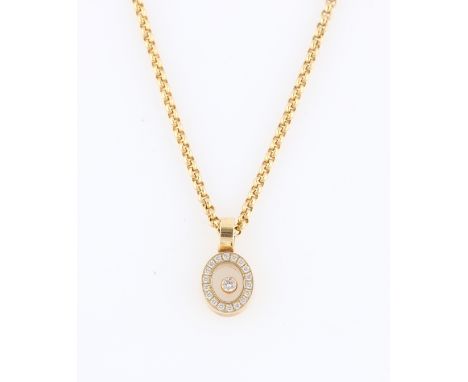 A Chopard Happy Diamond pendant, the oval design, featuring loose diamond to centre, surrounded by a border of eighteen diamo