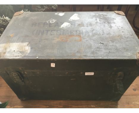 Military chest containing a selection of tools.