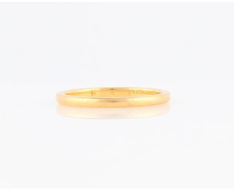 A hallmarked 22ct yellow gold wedding band, ring size M.