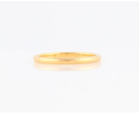 A hallmarked 22ct yellow gold wedding band, ring size M.