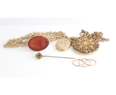 A lot to include a carved carnelian intaglio fob, on a gold plated chain, an open metalwork pendant on a chain stamped 375, a