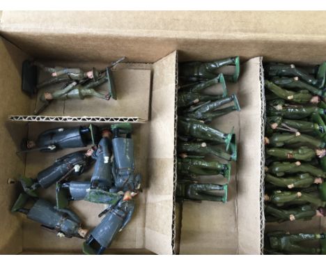 A box of toy soldiers including Britain’s homeguard, airborne infantry, red army guards, Australian infantry, twenty eight in