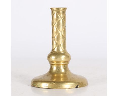 The socket with simple moulded lip, above a lattice-decorated stem and a squat ball-knop, on a spreading circular base with v