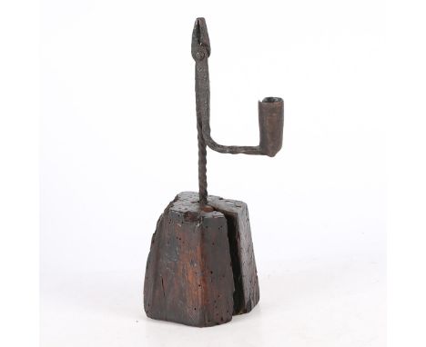 The twist-work rush-light with square-edge jaws, the angular rolled candle socket acting as a counterweight, on a facetted re