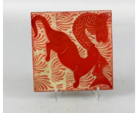 William de Morgan red lustre tile, decorated with an otter and a fish against a ground of painted grass, impressed marks for 