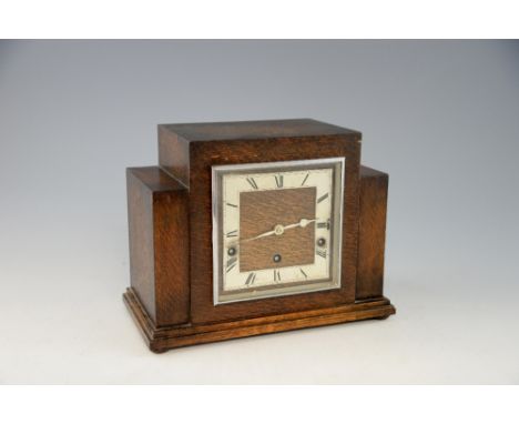Garrard three train mantle clock in Art Deco oak case, 23 x 39 cm.    