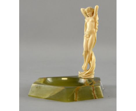 Johann Philipp Ferdinand Preiss a figure of a nude maiden, carved in ivory with an onyx dish base, signed in the ivory, F Pre