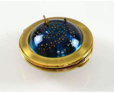 Kigu 'Flying Saucer' musical compact, the blue body decorated with gold stars, 7.5cm diameter,.    light scratching to enamel
