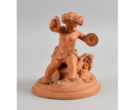 Watcombe, Torquay terracotta figure of a putto seated holding cymbals, impressed marks to base, 16.5cm. Provenance: part of T