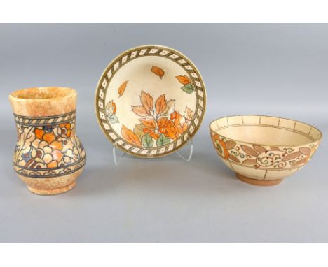 Charlotte Rhead, for Crown Ducal, three floral tube-lined pieces comprising two bowls and a vase, 18 cm high, all signed, (3)