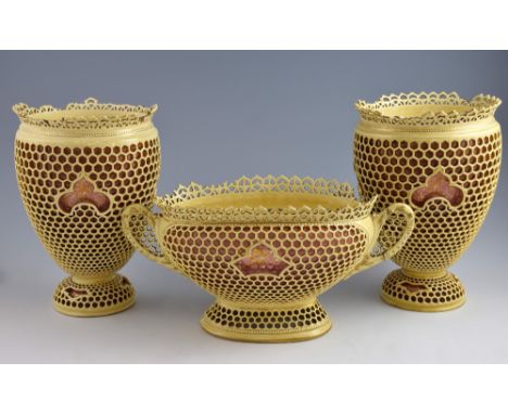 Set of three Zsolnay porcelain vases with reticulated decoration on pink ground highlighted in gilt, each stamped on base,  m