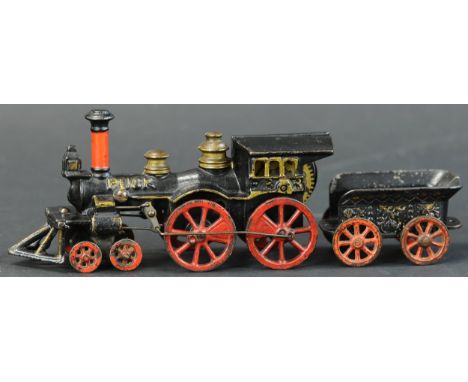 300. EARLY SECOR PUCK FLOOR LOCOMOTIVE | Very popular example, clockwork motor contained inside engine drives rear wheels, fr