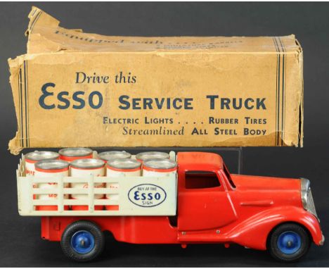 439. BOXED METALCRAFT ESSO STAKE TRUCK | Provenance: Paul Cole Collection. | 13" l. | Box distressed at one end and worn thro