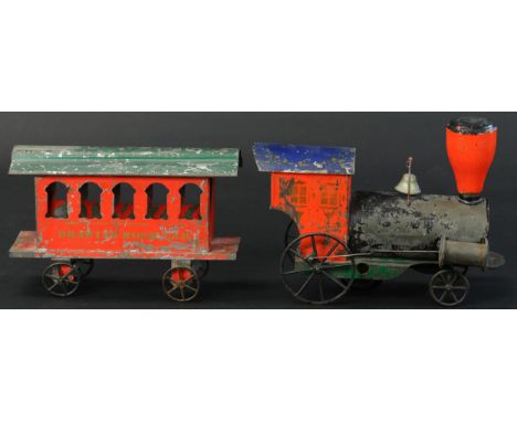 421. FALLOWS CLOCKWORK TRAIN SET | Provenance: Paul Cole Collection. | Loco 10" l. | One wheel on engine repaired, otherwise 