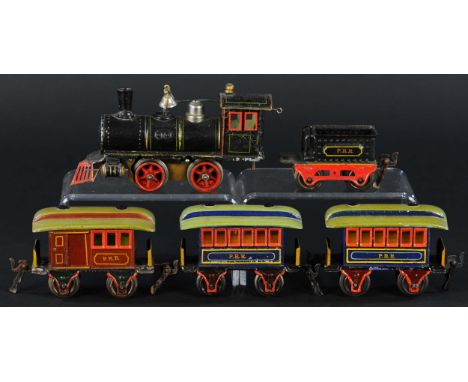 589. MARKLIN AB1020 PRR PASSENGER SET | O gauge, clockwork, hand painted, has bell and cowcatcher for American market, cars h
