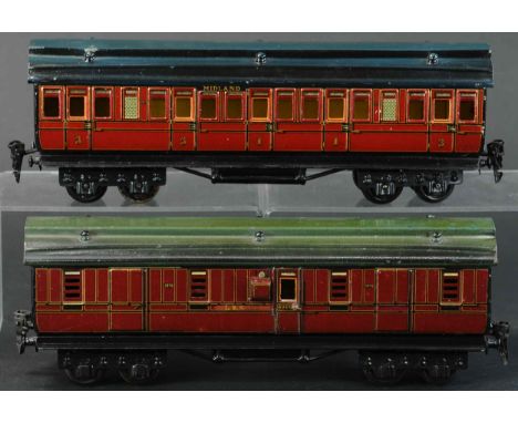 770. TWO MARKLIN MIDLAND RAILWAY CARS | O gauge, litho. Provenance: Paul Cole Collection. | 12" l. | Frame on baggage car app