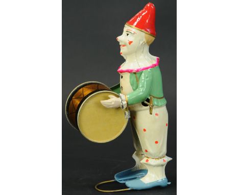 116. FLEISCHMANN GERMAN CLOWN DRUMMER | Old store stock condition, painted clown figure bangs his large lithograph drum when 