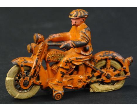 388. HUBLEY HARLEY DAVIDSON CIVILIAN CYCLE | Rubber tires, orange paint version. | Provenance: Paul Cole Collection. | 6" l. 