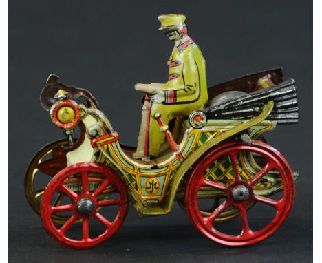 87. LARGE HORSELESS CARRIAGE PENNY TOY | Large scale example with great litho and gyro powering rear wheels. | Provenance: Pa