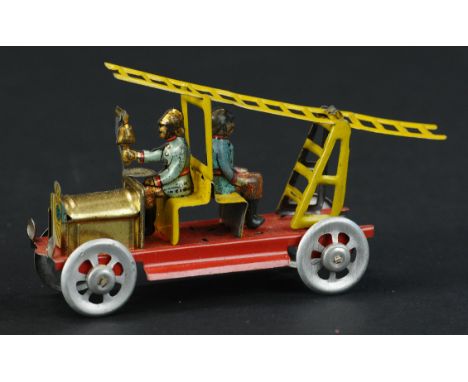 20. MEIER FIRE LADDER TRUCK PENNY TOY | Provenance: Paul Cole Collection. | 4" l. | (Pristine Condition) | $300 - $500