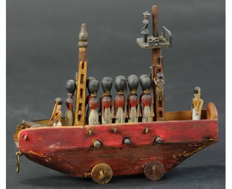 178. LARGE ERZGEBIRGE / THURINGIA WARSHIP W / SOLDIERS | A very rare and hard to find painted wooden gunboat with armed soldi