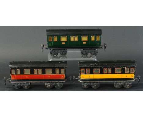 780. MARKLIN PLM PASSENGER CARS | O gauge, hand painted, three car set including first, second, and third class coaches in "P