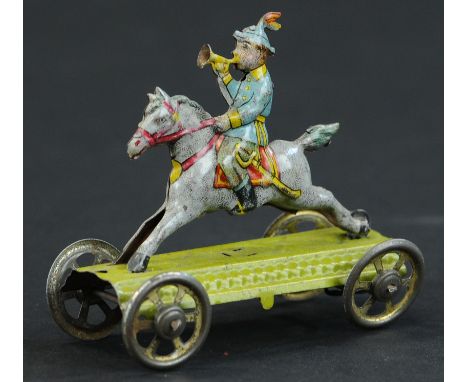 43. MEIER BUGLE BOY ON HORSE PENNY TOY | Provenance: Paul Cole Collection. | 4.75" l. | (Excellent Condition) | $400 - $700