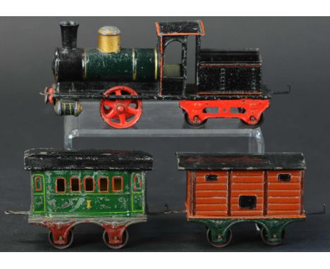 769. MARKLIN O GAUGE FLOOR TRAIN | O gauge in size, un-powered loco, wheels without flanges, hand painted. Provenance: Paul C