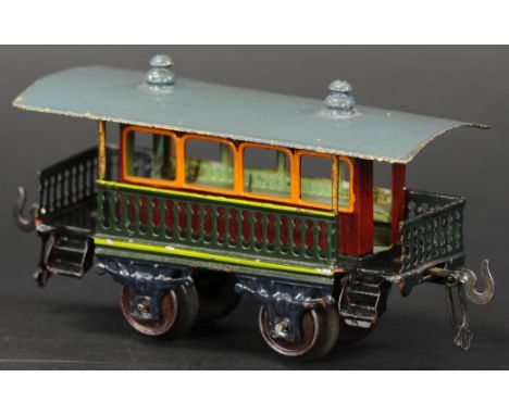 634. BING 7088/0 SUMMER CAR | 0 Gauge, hand painted, desirable open air summer car with railing lining the ends and open side