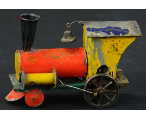 419. SMALL IVES CLOCKWORK TRAIN ENGINE | Small example retains most of its paint, though the roof of cab has been significant