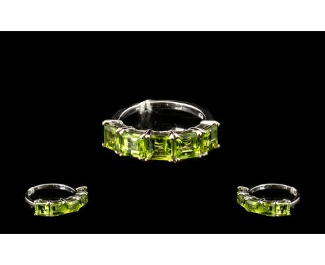 Peridot Band Ring, five square cut peridots, totalling 3.25cts, set closely, across the finger, in silver; size O