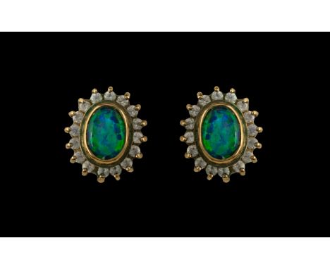 Pair of Opal Stud Earrings surrounded by CZ stones.  Original receipt from Baubles the Jewellers of Church Street, Blackpool,