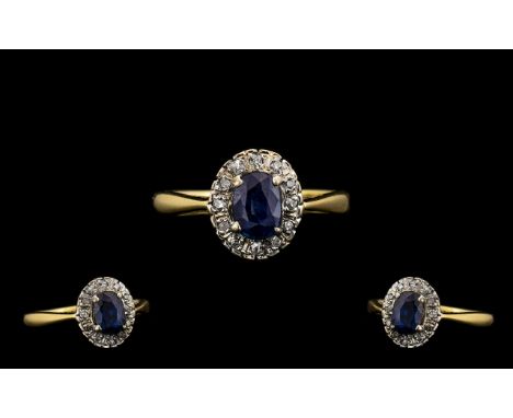 Ladies 18ct Gold Attractive Sapphire and Diamond Set Cluster Ring. Flower head Setting. Full Hallmark for 18ct. Ring Size - K