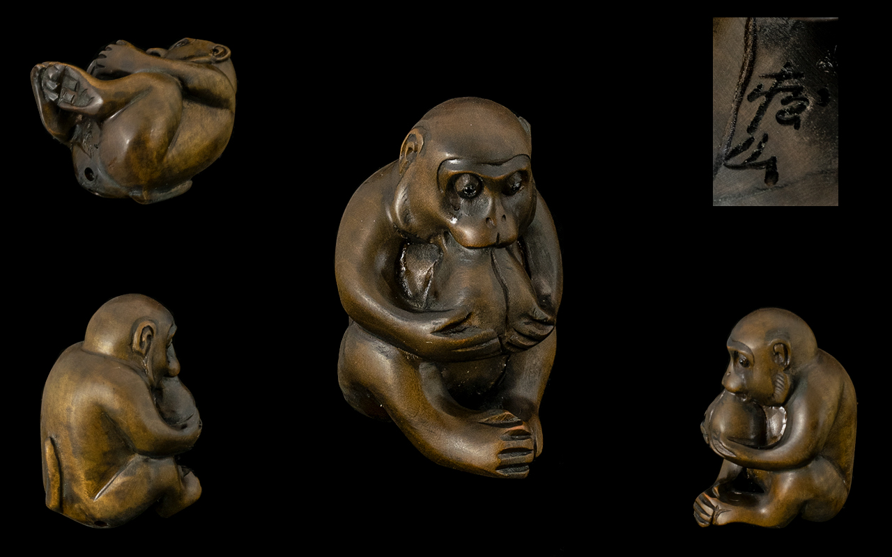 Oriental Carved Boxwood Netsuke, Depicts a Seated Figure of a Monkey