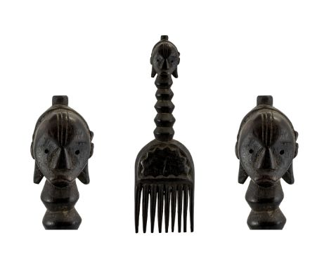 Africa Tribal Comb the handle in the form of a head with an elongated neck. 12'' in length.  Please see images.