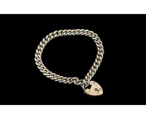 Silver Albert Chain hallmarked silver, Albert with heart shaped lock.  18'' in length.  Please confirm with photograph.