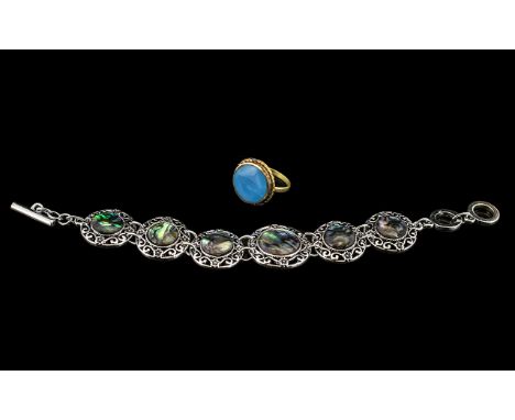 An Opal Stone Bracelet together with a Jade stone Ring.