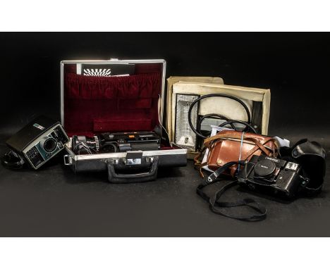 A Collection of Cameras to include Kodak 66 camera in a brown leather case circa 1950's, Konica C35 camera with black case ci