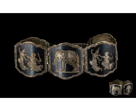 Oriental Silver Nielio Worked 5 Panel Engraved Bracelet weight 50 grams.  Please see images.