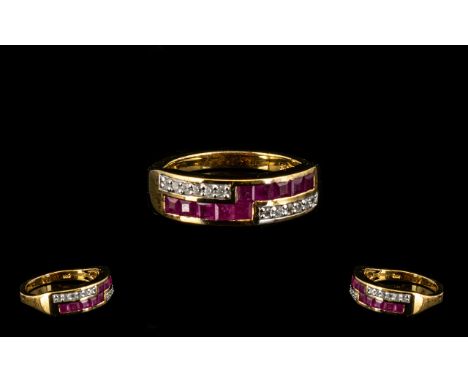 Ruby Band Ring, a double row ring comprising 1.2cts of closely set, square cut rubies running halfway along the lower row, tu