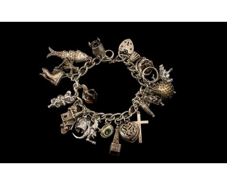 Vintage Silver Bracelet, Loaded with ( 18 ) Silver Charms of Good Quality and Interest. Comprises Koala Bear, Kangaroo, Artic