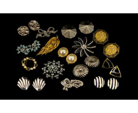 Vintage Costume Jewellery.  Good collection of brooches and clip on earrings to include some silver.  Please see accompanying