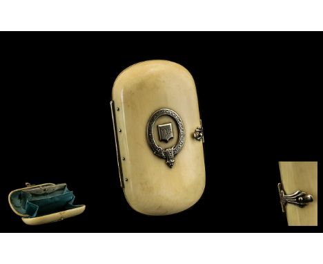 Antique Ivory Ladies Purse, blue silk lined to the interior, silver crest inlaid to the top, a garter with engraved plaque FA