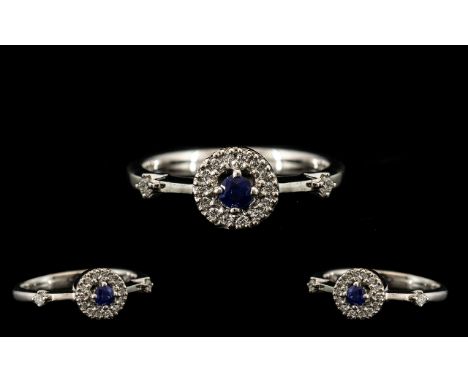 18ct White Gold - Attractive and Elegant Diamond and Sapphire Set Dress Ring, Flower head Design. Marked 750 - 18ct to Interi