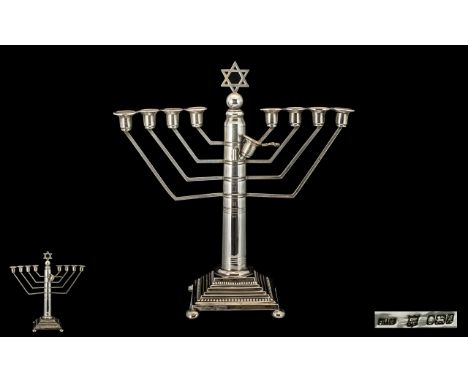 Silver Hanukkah Menorah Surmounted With Star Of David Above A Circular Tapering Column Raised On A Square Stepped Filled Base