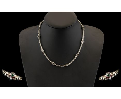 A Fine Quality Silver Antique Necklace with unusual enamel beads applied. Indian Mogul Design with hook clasp. Measures 16 in