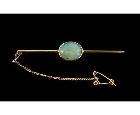 Antique Period - Attractive 15ct Gold Fire Opal Set Brooch, with Attached Safety Chain. Marked 15ct. The Large Cabunchon Cut 